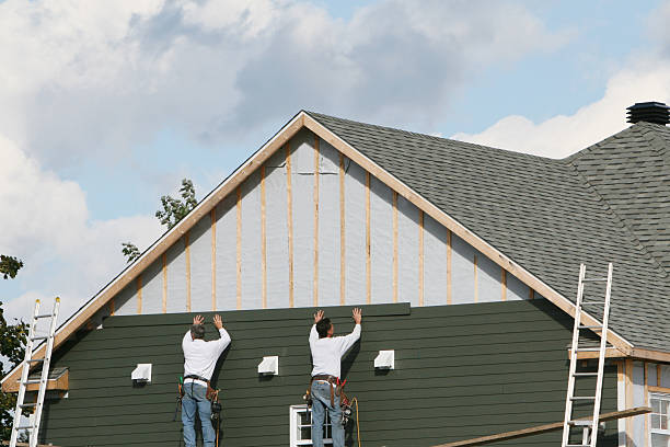 Professional Siding Repair technician working in Fredericktown, OH
